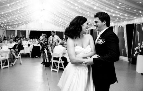 Bride and Groom in marquee black and white